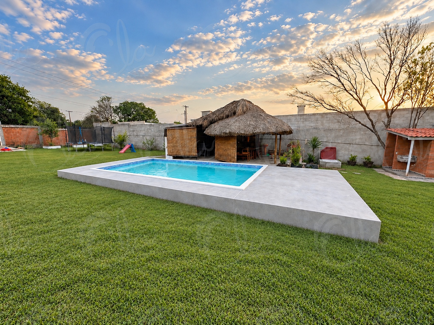 Jardín con palapa